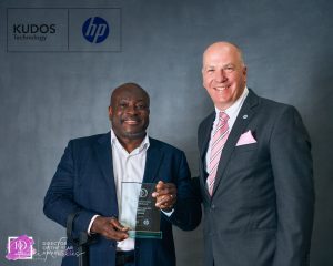 Mark Esho from Easy Internet Solutions receives his award from Ian Mckelaar Kudos Technologyy