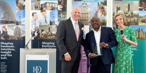 IoD Director of the year Mark Esho recieving his award from Ian McKellar Kudos technology. Photo courtesy of Peter Nutkins